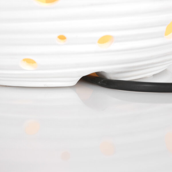 Tischleuchte Jazz Mond mit leuchtenden Löchern der Firma Steinhauer